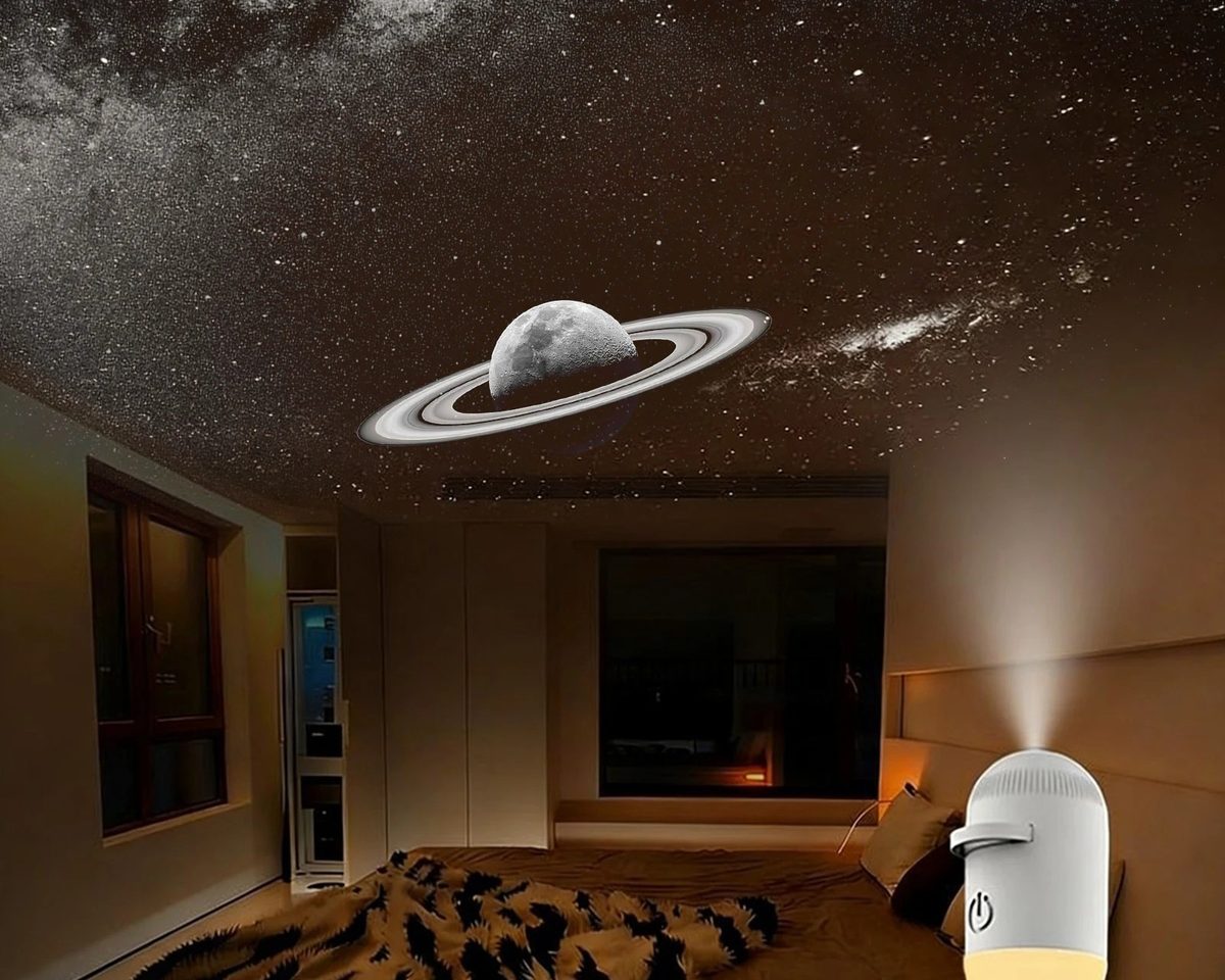Habitación a oscuras con el efecto de proyección de estrellas y nebulosa en el techo